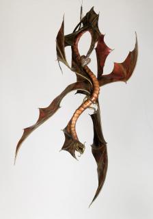 Appraisal: Mixed metal hanging dragon sculpture h Contemporary mixed metal hanging