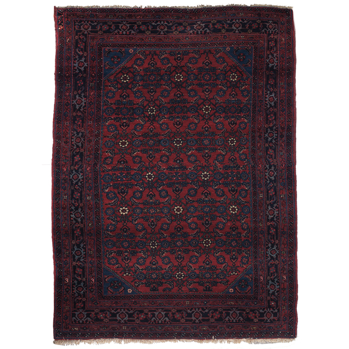 Appraisal: Persian Angeles rug c floral design on a red field