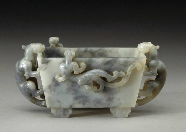 Appraisal: A mottled black and white jade basin Of rectangular section