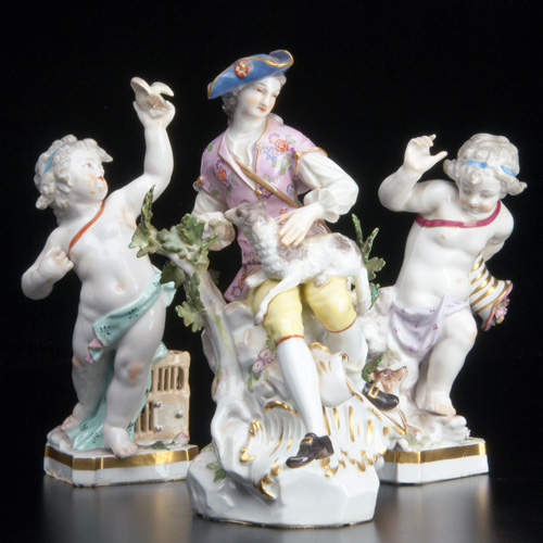 Appraisal: CONTINENTAL PORCELAIN Group of figurines young man and lamb by