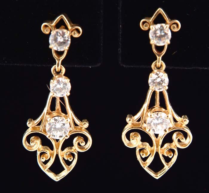 Appraisal: A PAIR OF K YELLOW GOLD AND DIAMOND EARRINGS The