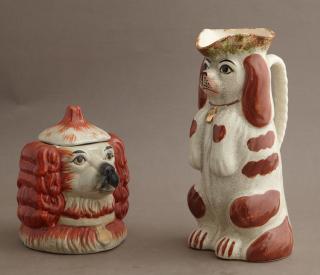 Appraisal: Two Staffordshire Style Dogs one a pitcher th c the