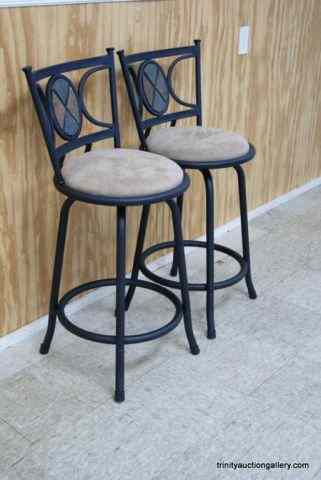 Appraisal: Pair of Heavy Ornamental Iron Bar StoolsFrom the modern era