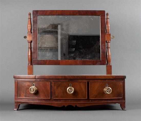 Appraisal: Federal mahogany three-drawer shaving stand mirrored upright on base with