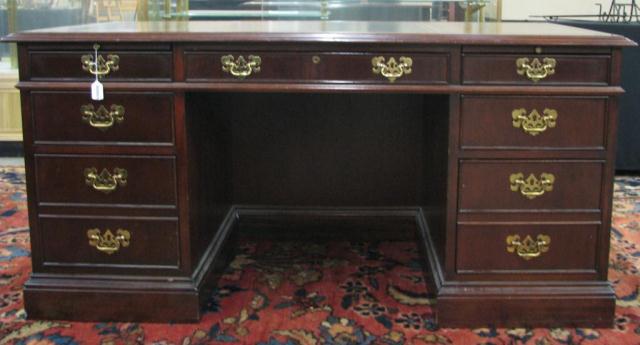 Appraisal: Sligh Mahogany Leather Top Desk double pedestal knee hole style