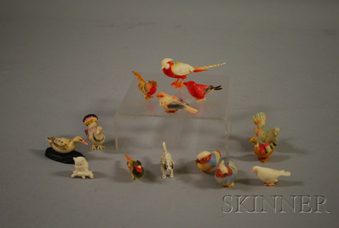 Appraisal: Fourteen Miniature Carved and Painted Ivory Animal and Bird Figures