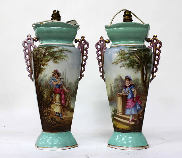 Appraisal: A PAIR OF CONTINENTAL TURQUOISE GROUND PORCELAIN VASES with decorative