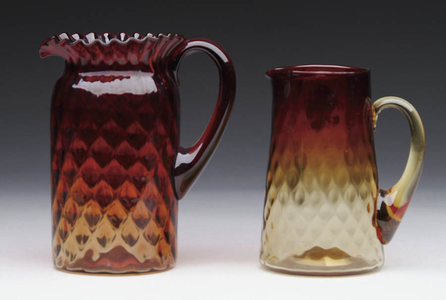 Appraisal: TWO AMBERINA PITCHERS Cream pitcher has inverted thumbprint pattern with