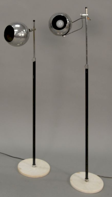 Appraisal: Pair of Italian modern floor lamps with chrome globular shade