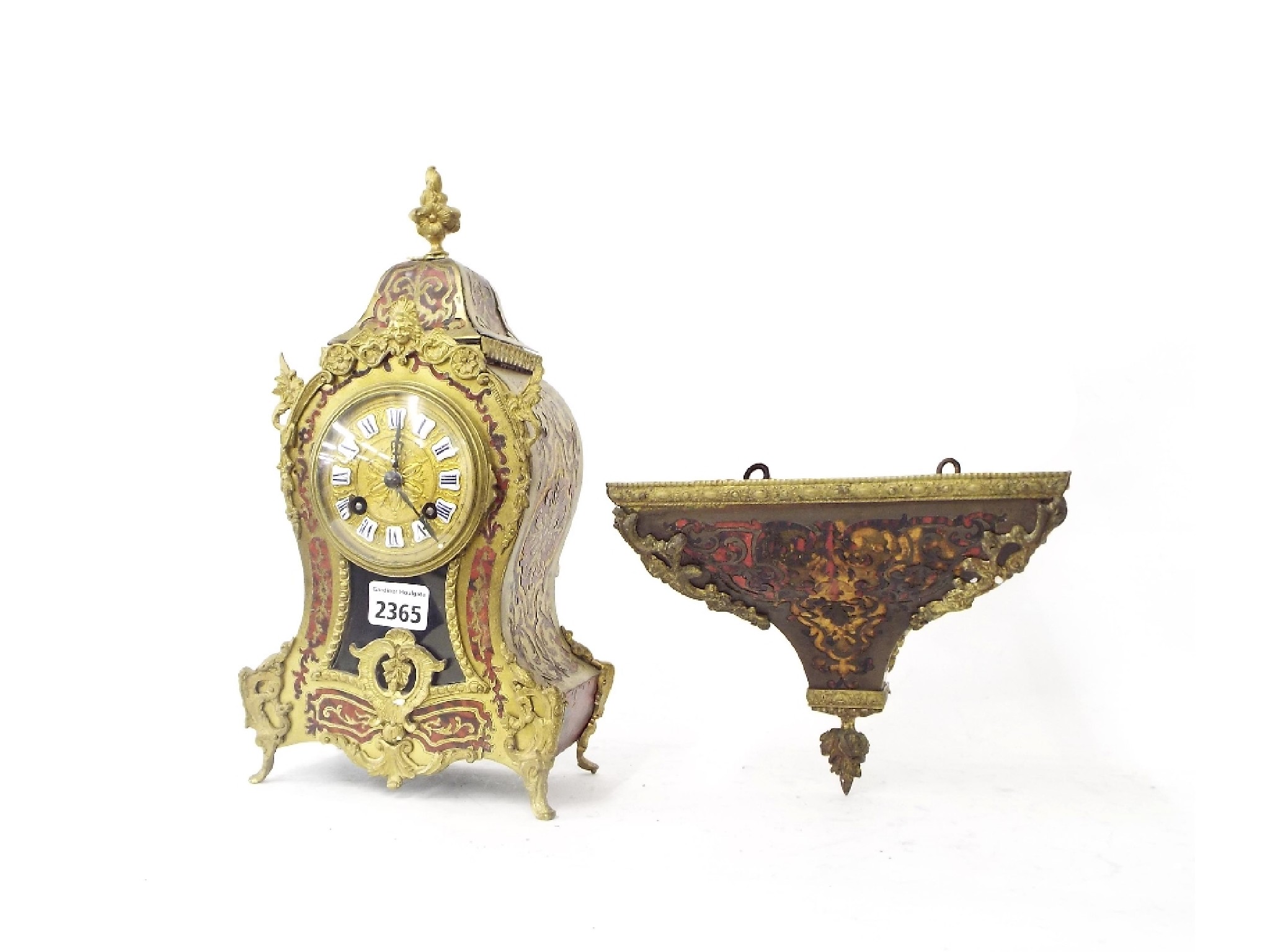 Appraisal: Small boulle balloon shaped two train bracket clock the movement