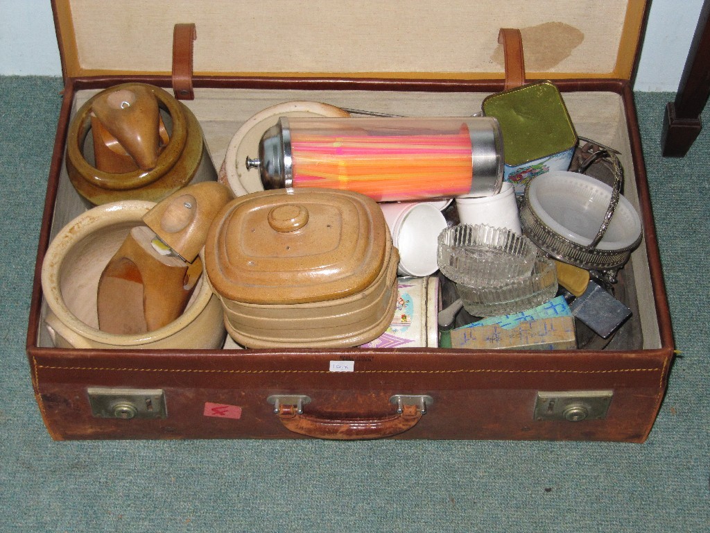 Appraisal: Leather suitcase with bricabrac