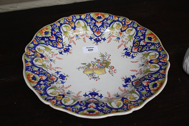 Appraisal: AN OLD CONTINENTAL FAIENCE CHARGER centrally decorated in coloured enamels