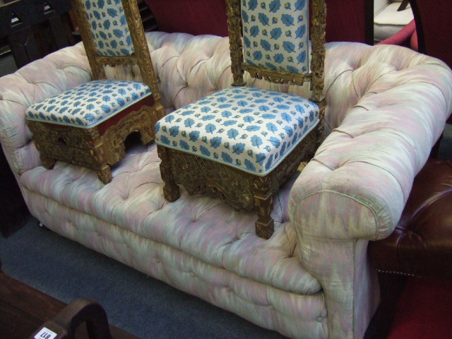 Appraisal: An early th century button back Chesterfield sofa raised on