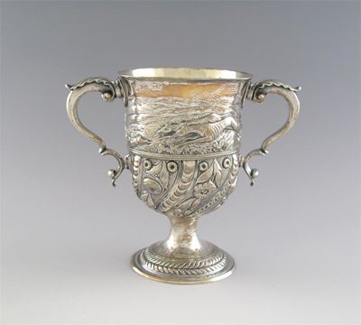 Appraisal: A George III later embossed cup decorated with a hare