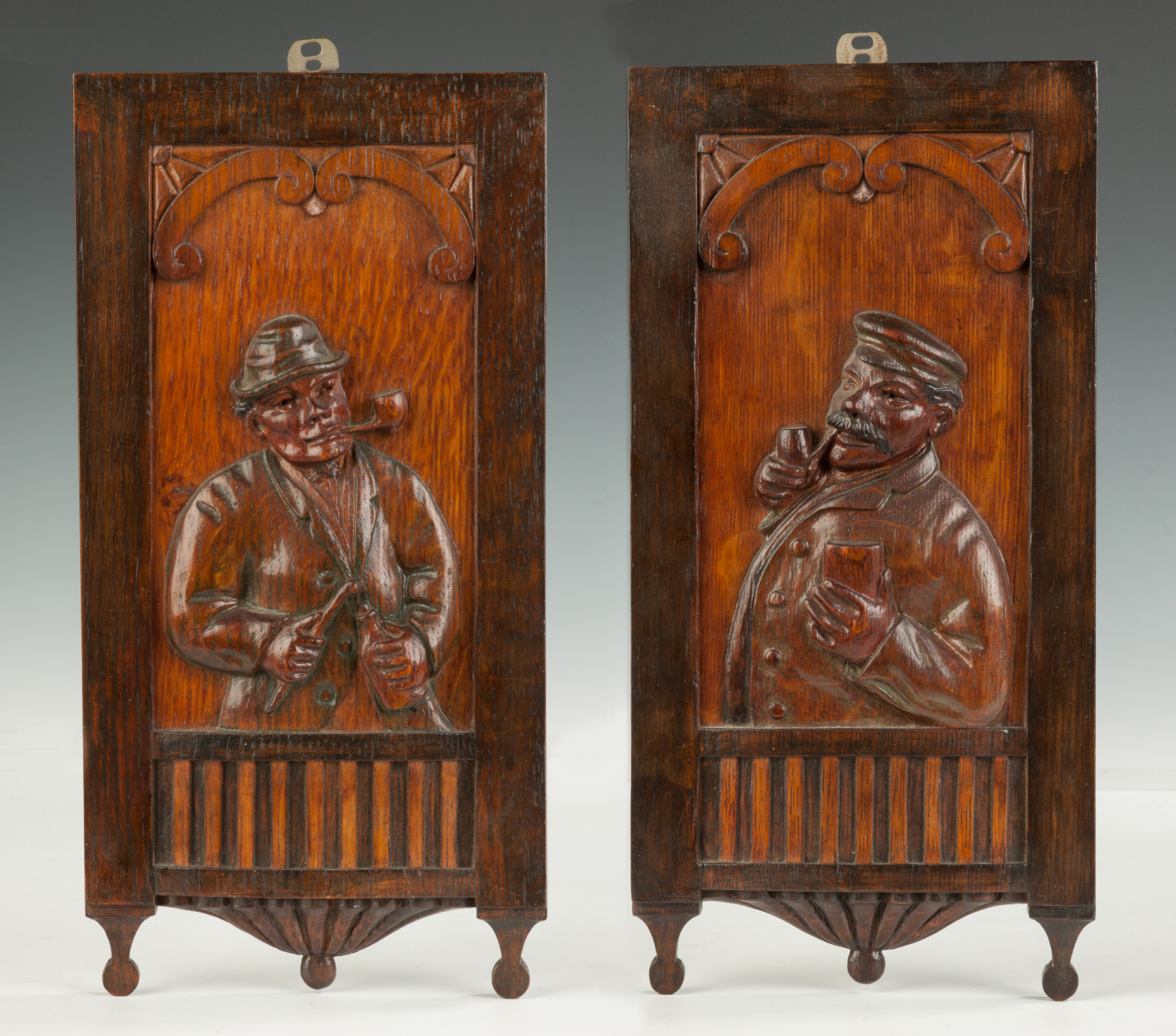 Appraisal: Carved Patinaed Oak Plaques C 's sawn oak Of Gentleman