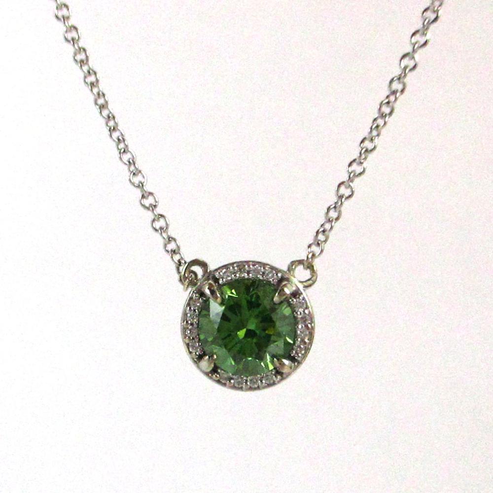 Appraisal: GREEN DIAMOND WHITE DIAMONDS AND FOURTEEN KARAT WHITE GOLD PENDANT