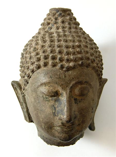 Appraisal: A th century Northern Thai head of Buddha lanna style