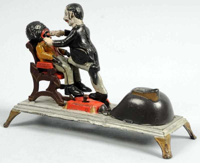 Appraisal: Cast Iron Dentist Mechanical Bank Manufactured by J E Stevens