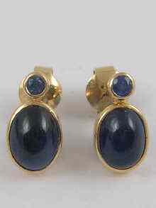 Appraisal: A pair of yellow metal tests ct gold cabochon sapphire