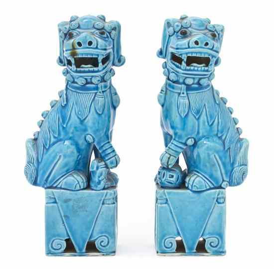 Appraisal: A Pair of Chinese Fu Dogs each of typical form