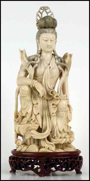 Appraisal: CHINESE CARVED IVORY FIGURE OF A SEATED QUAN YIN Provenance