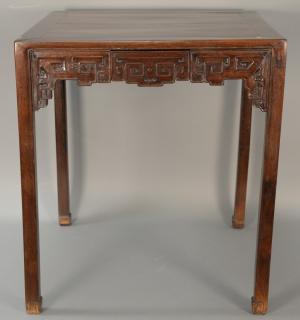 Appraisal: Qing Dynasty game table having square top over scroll carved