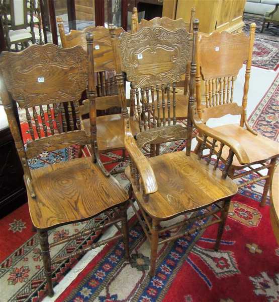 Appraisal: A GROUP OF FIVE OAK PRESS-BACK DINING CHAIRS American antique