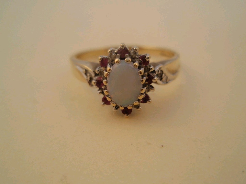 Appraisal: A ct gold opal cluster ring