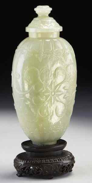 Appraisal: Chinese Qing carved Mughal style jade urnfinely carved to depict