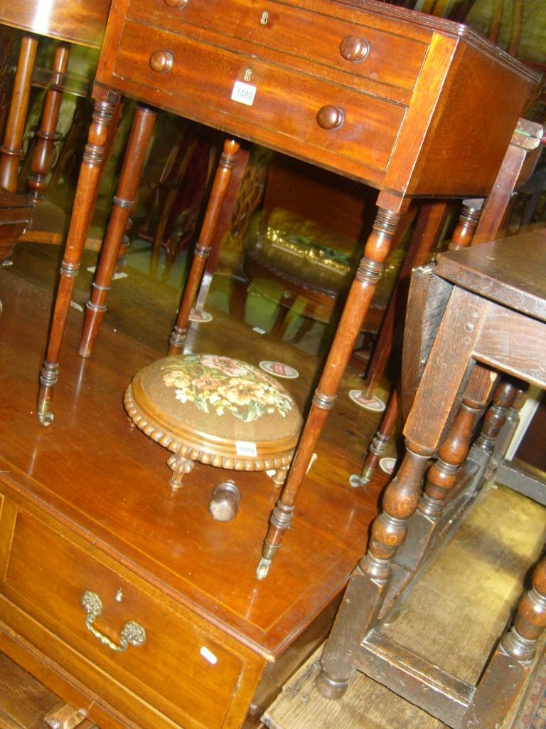 Appraisal: A small Regency mahogany sewing side table fitted with two