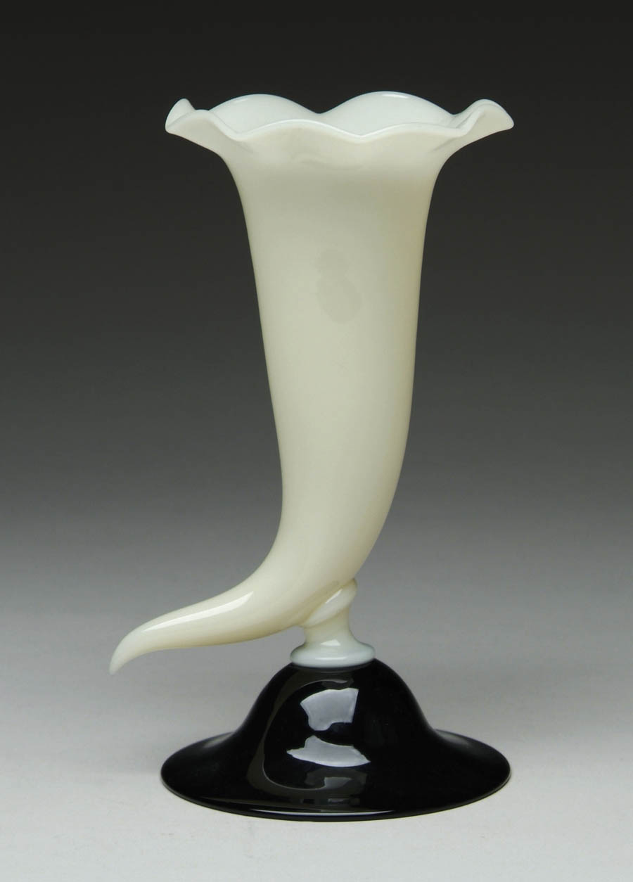 Appraisal: STEUBEN CORNUCOPIA VASE Nice Steuben ivory cornucopia vase on an