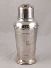 Appraisal: An Art Deco silver plated cocktail shaker complete with strainer