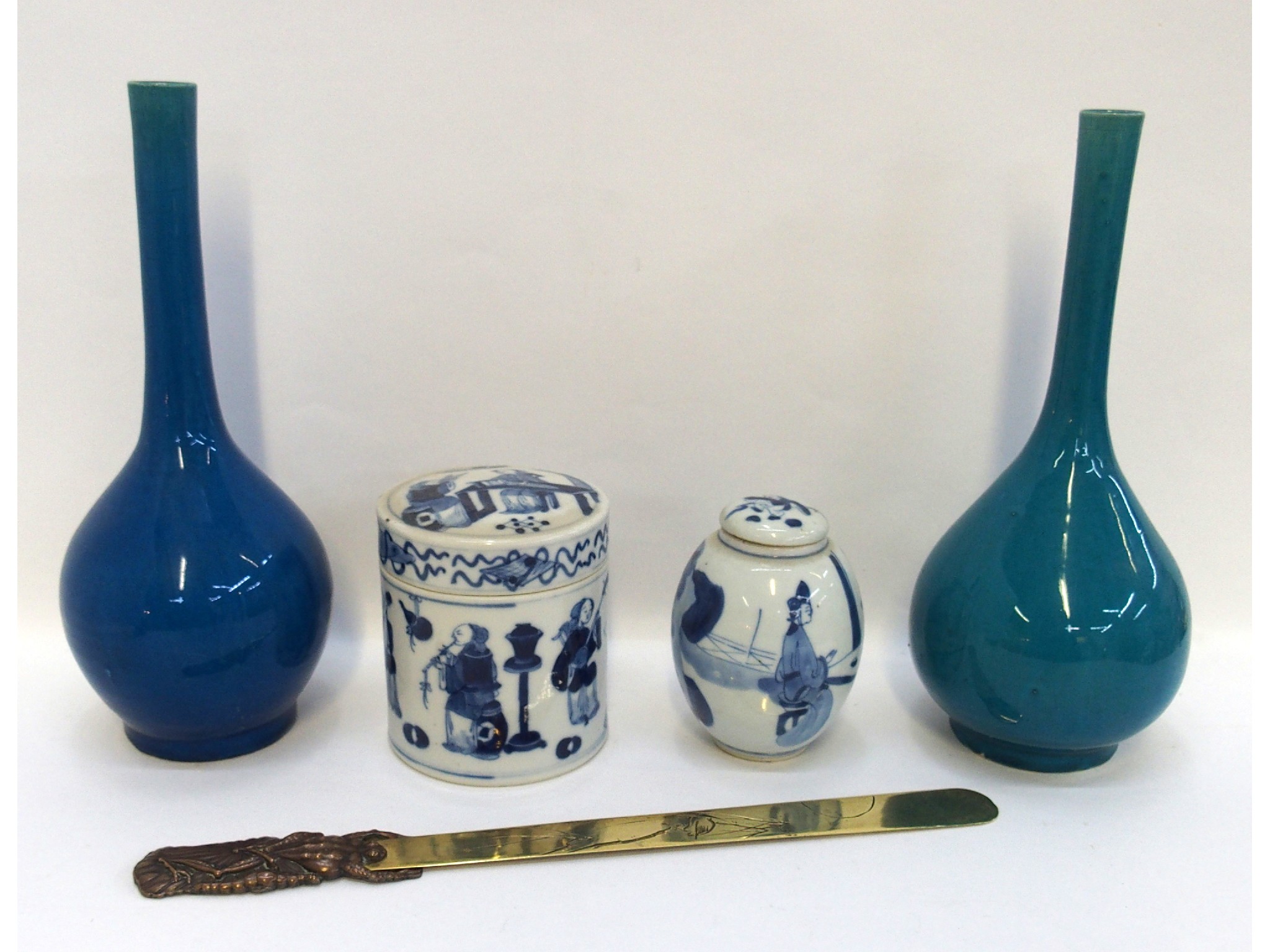 Appraisal: Two turquoise glazed bottle vases two blue and white jars