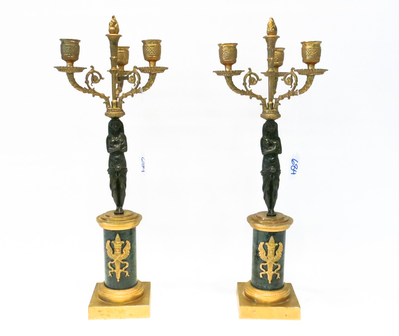 Appraisal: PAIR OF FRENCH EMPIRE GILT BRONZE CANDELABRA each having caryatid