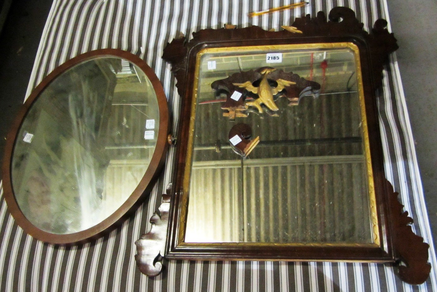 Appraisal: A th century mahogany fret cut pier glass mirror together