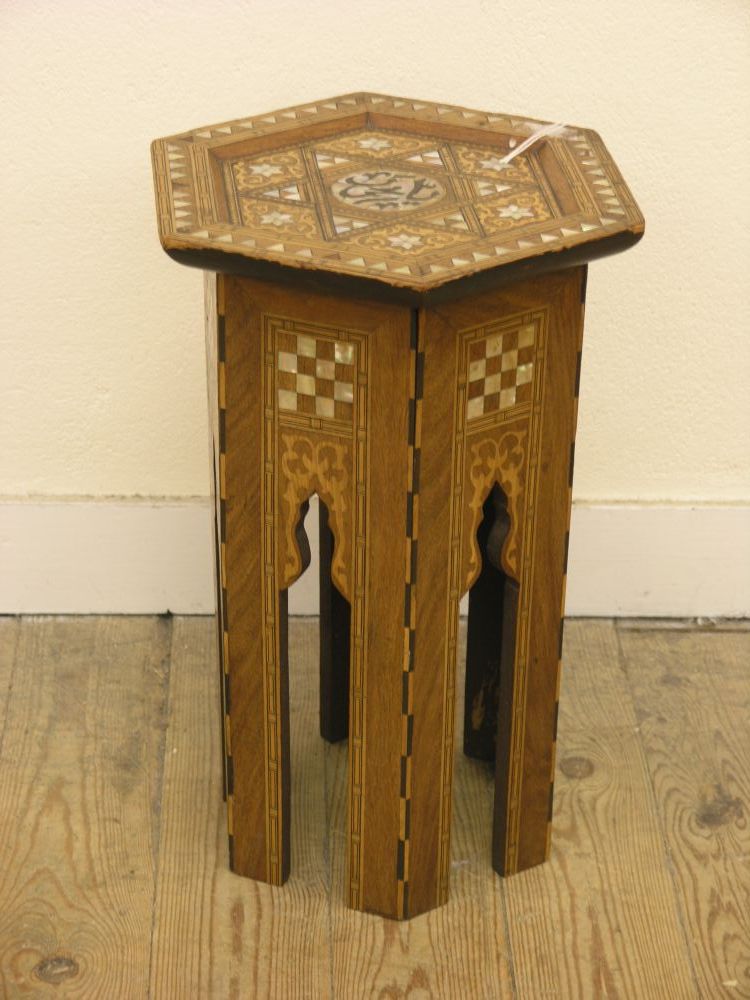 Appraisal: A hexagonal Moorish occasional table elaborately inlaid with mother of