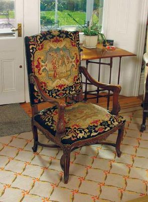 Appraisal: A carved and stained wood Louis XV style fauteuil having