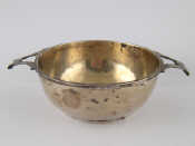 Appraisal: A silver two handled porringer cm across Mappin and Webb