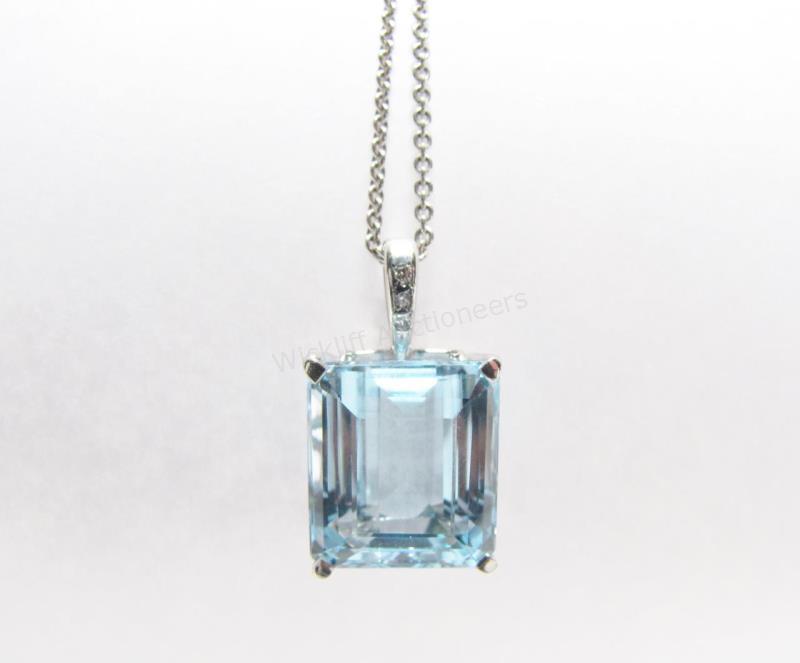 Appraisal: A K white gold pendant with a ct emerald cut