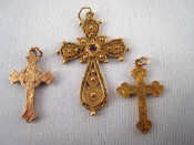 Appraisal: Three ct gold pendant crosses one with central stone wt