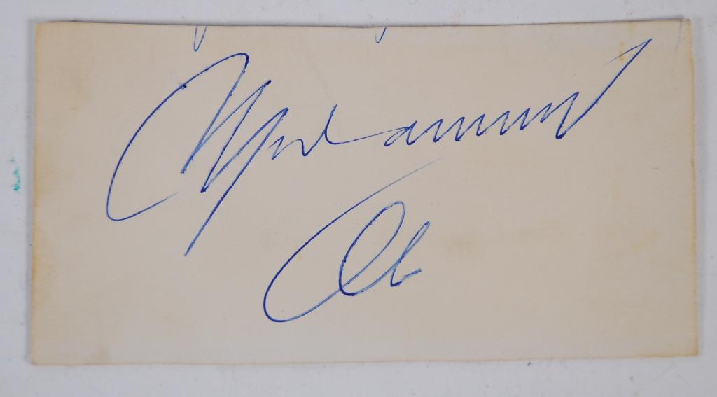 Appraisal: MUHAMMAD ALI AUTOGRAPH on a cutting from a Variety Club