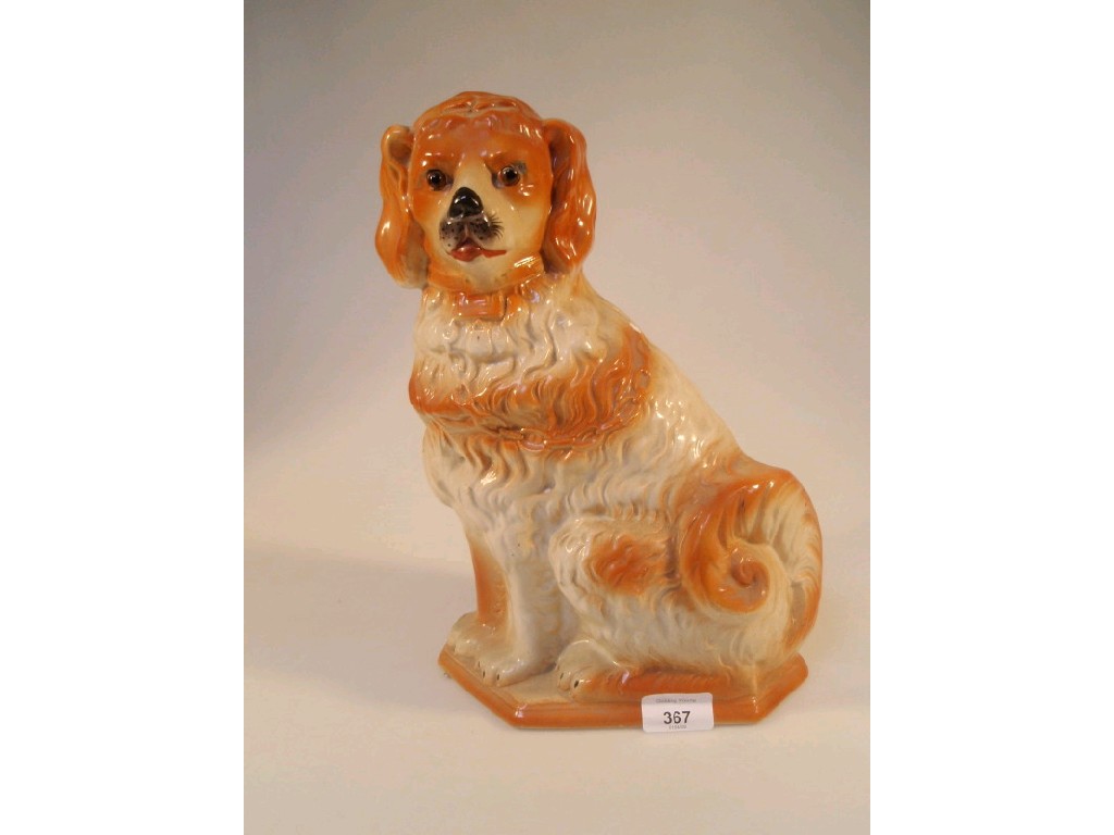 Appraisal: A late thC Staffordshire type seated spaniel with glass eyes