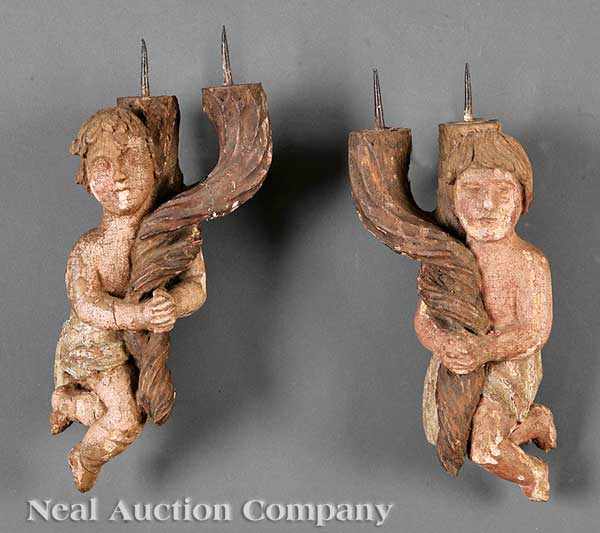 Appraisal: A Pair of Antique Continental Carved and Polychromed Wood Figural