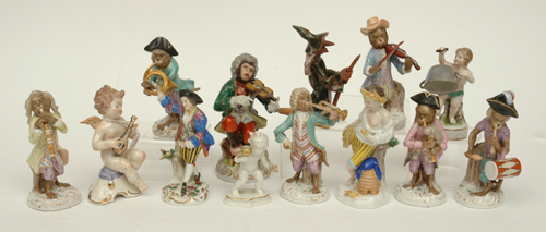 Appraisal: A COLLECTION OF PORCELAIN FIGURES Including a continental porcelain monkey