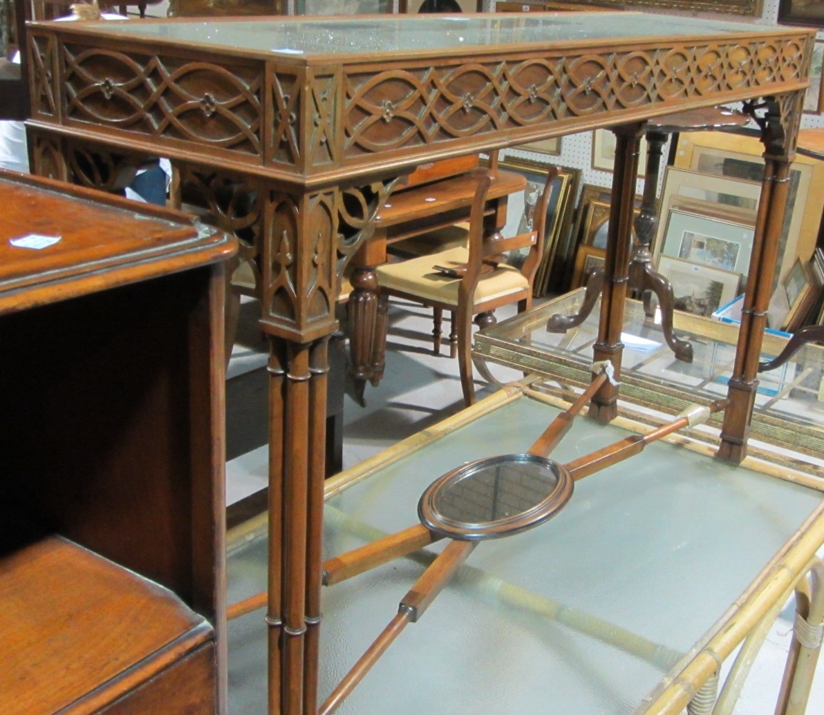 Appraisal: A th century walnut rectangular table with inset mirror top