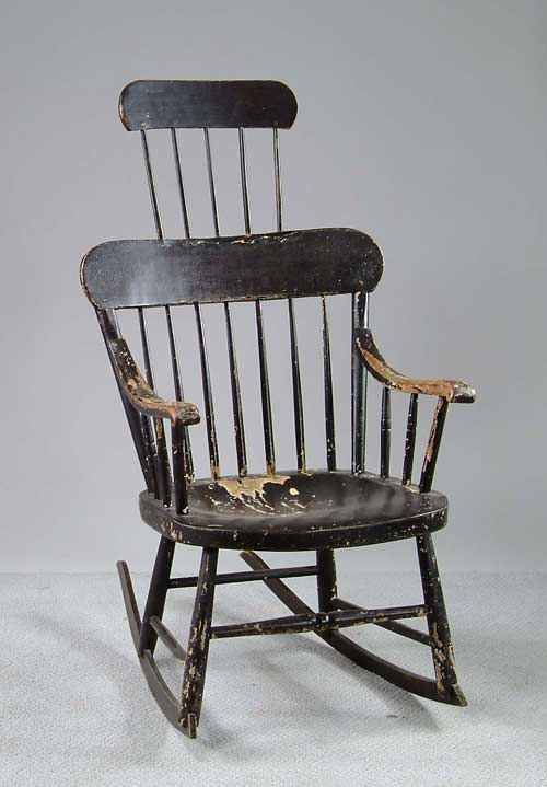 Appraisal: PAINTED COMB BACK WINDSOR ROCKER Painted black spindle back antique