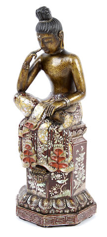 Appraisal: A mother-of-pearl-inlaid and lacquer seated figure Probably Korean th th