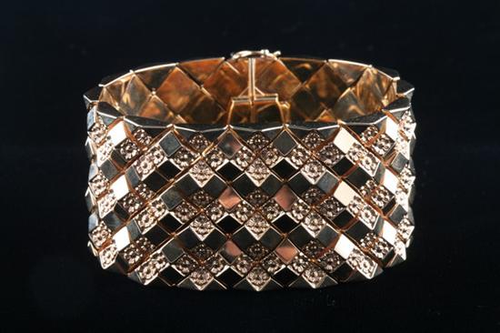 Appraisal: ITALIAN K YELLOW GOLD FLEXIBLE-LINK STRAP BRACELET mid- th century