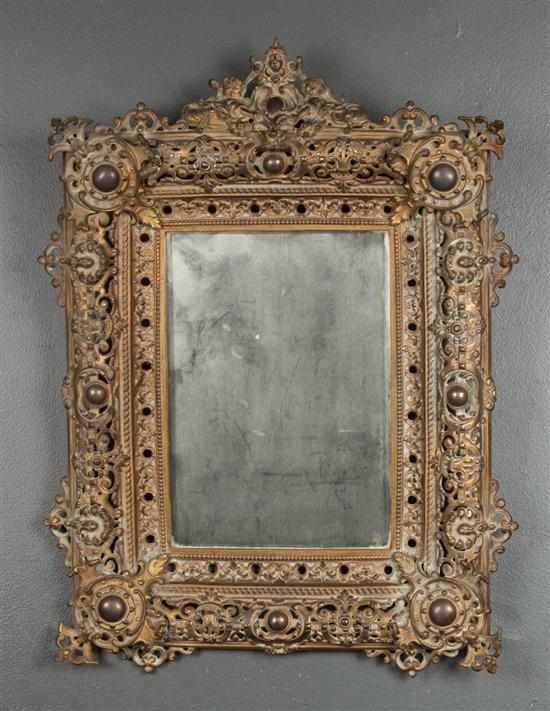 Appraisal: Renaissance Revival pierced brass mirror late th century in L