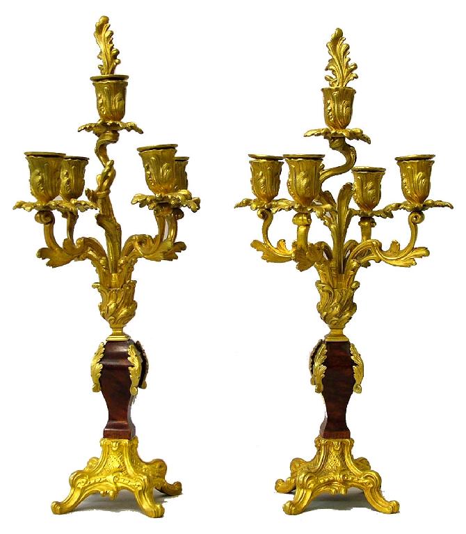 Appraisal: Pair of Rococo style gilt metal five branch candelabra of